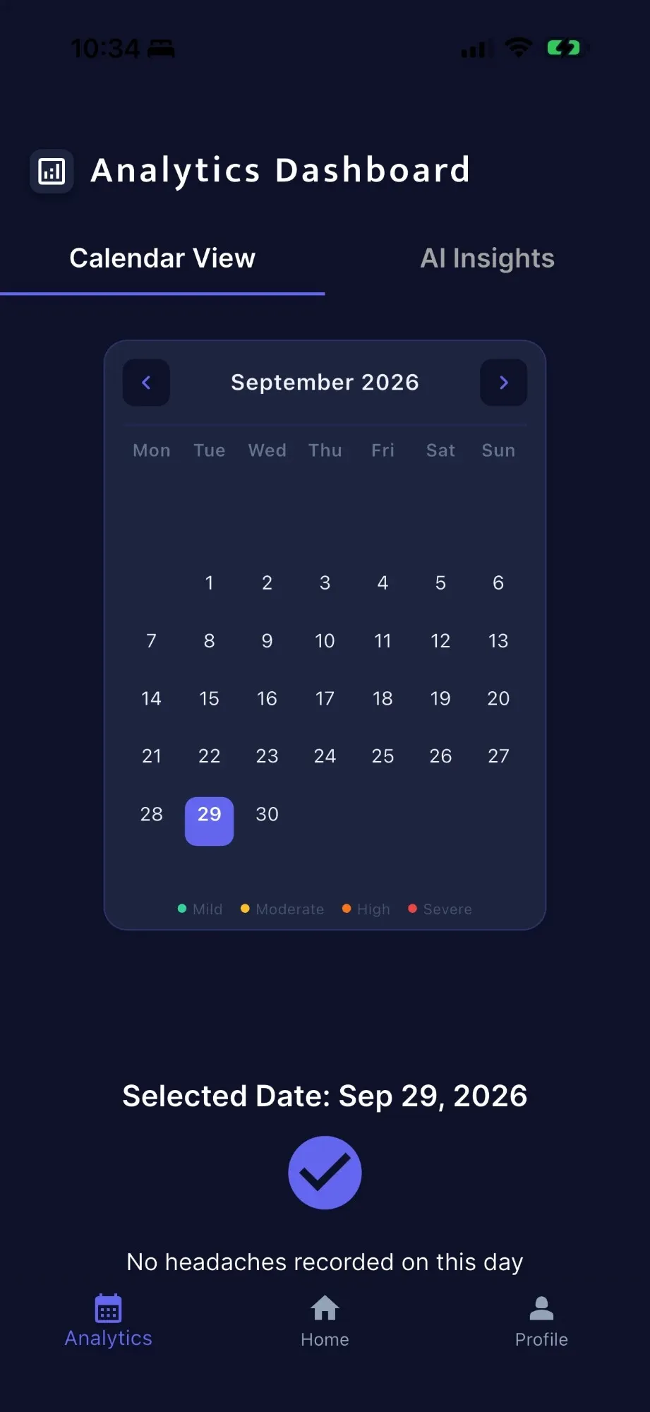 HeadacheWise calendar view with a mild to severe severity legend